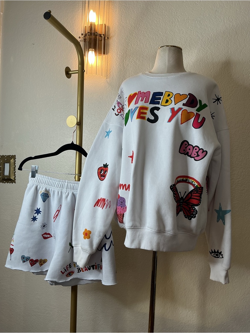 White Graphic Crewneck Sweatshirt and Colorful Printed Design Shorts